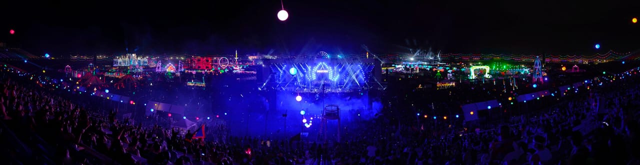 Electric Daisy Carnival Las Vegas with fireworks above kinetic stage at night