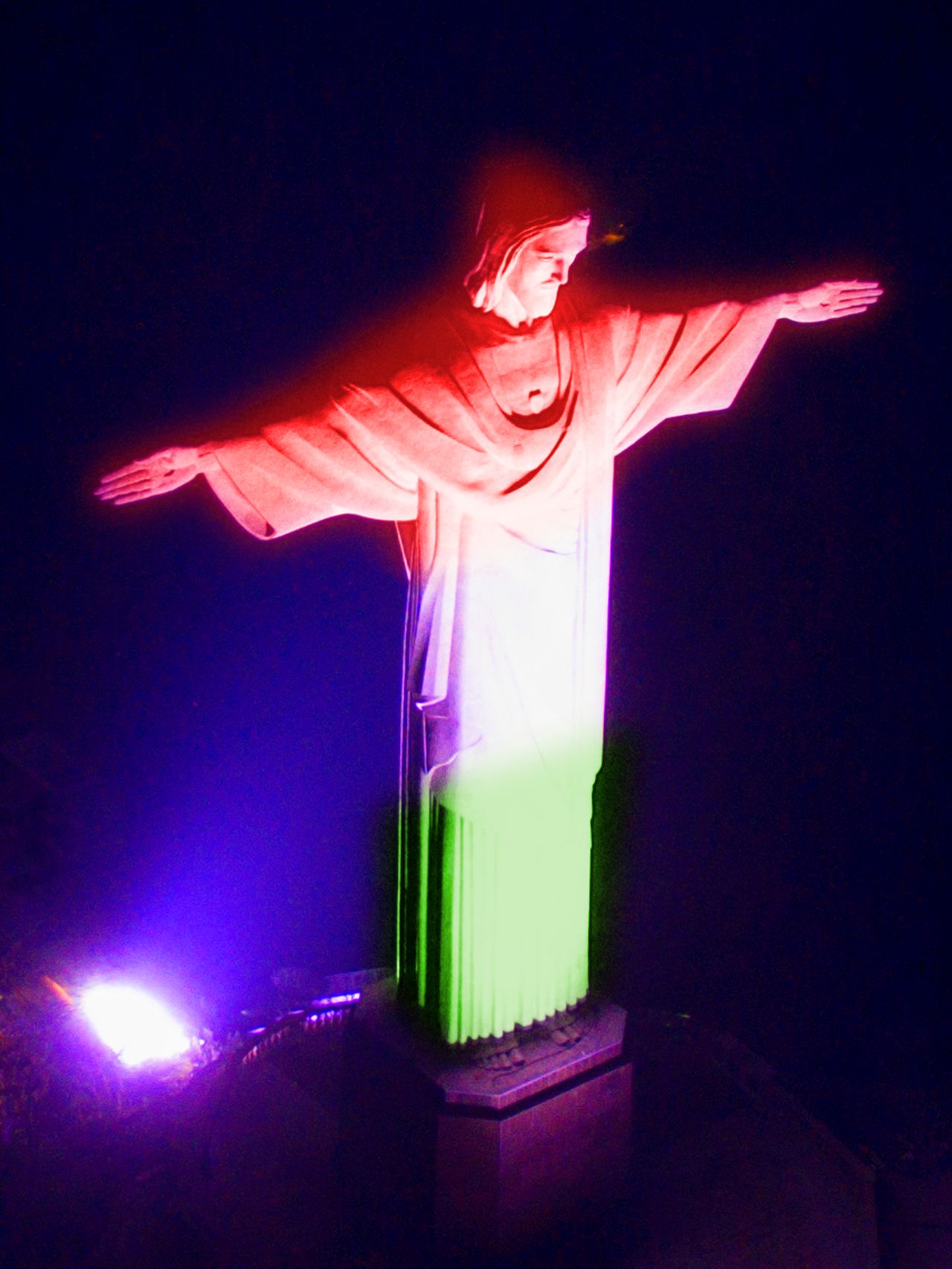 Rock in Rio Brazil festival main stage with crowd and Christ the Redeemer visible in background
